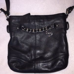 This is a coach purse,very cute and useful!